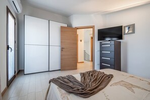 4 bedrooms, iron/ironing board, travel crib, WiFi