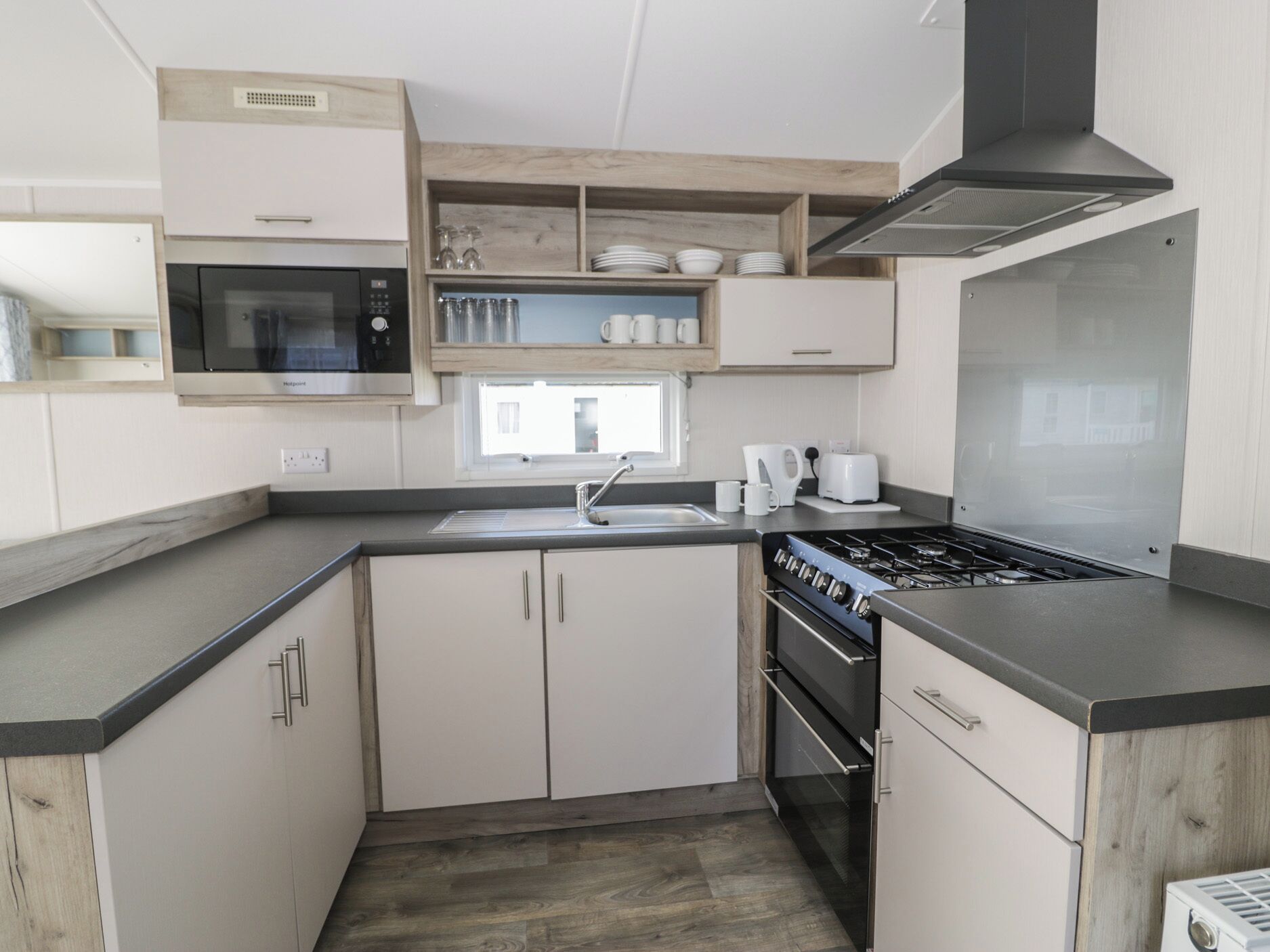 Fridge, toaster, cookware/dishes/utensils