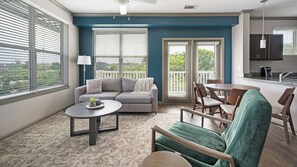 Apartment, 2 Bedrooms | Living area | 50-inch TV with digital channels