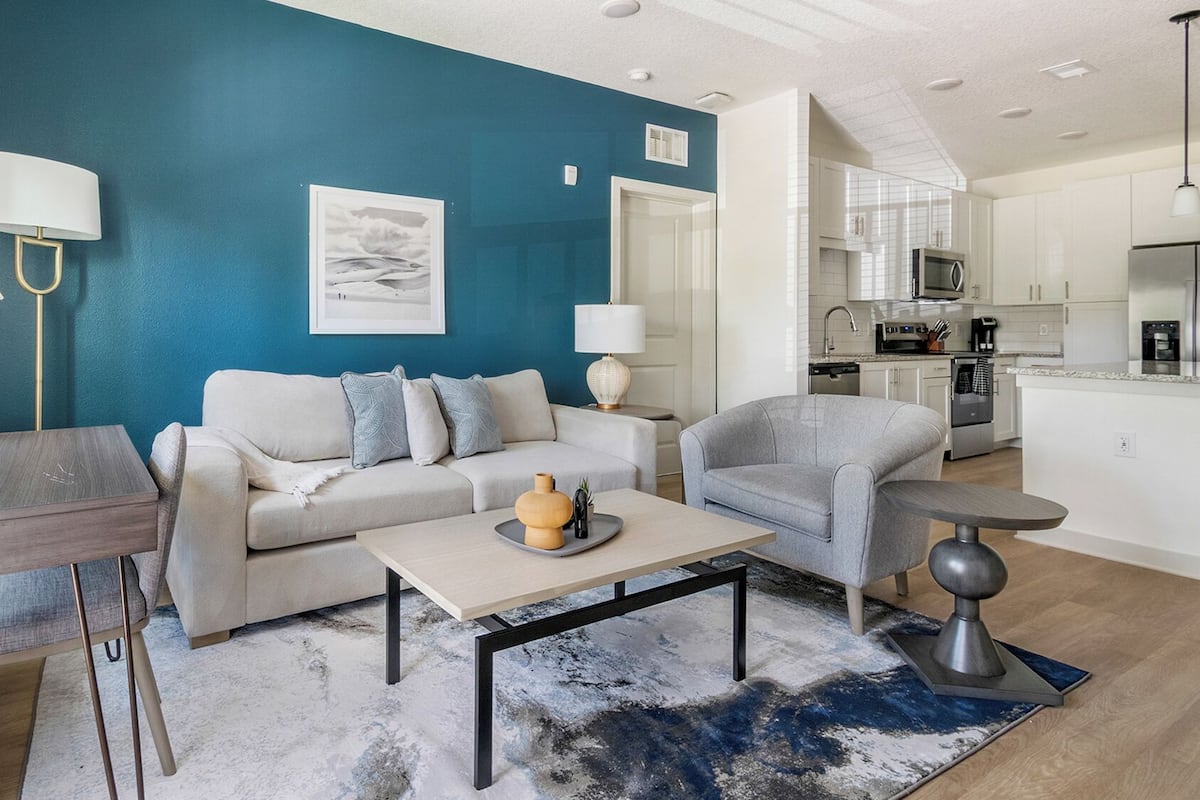 Apartment, 2 Bedrooms | Living area | 50-inch TV with digital channels