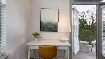 Apartment, 1 Bedroom | Living area | 50-inch TV with digital channels