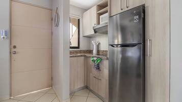 Fridge, microwave, coffee/tea maker, electric kettle
