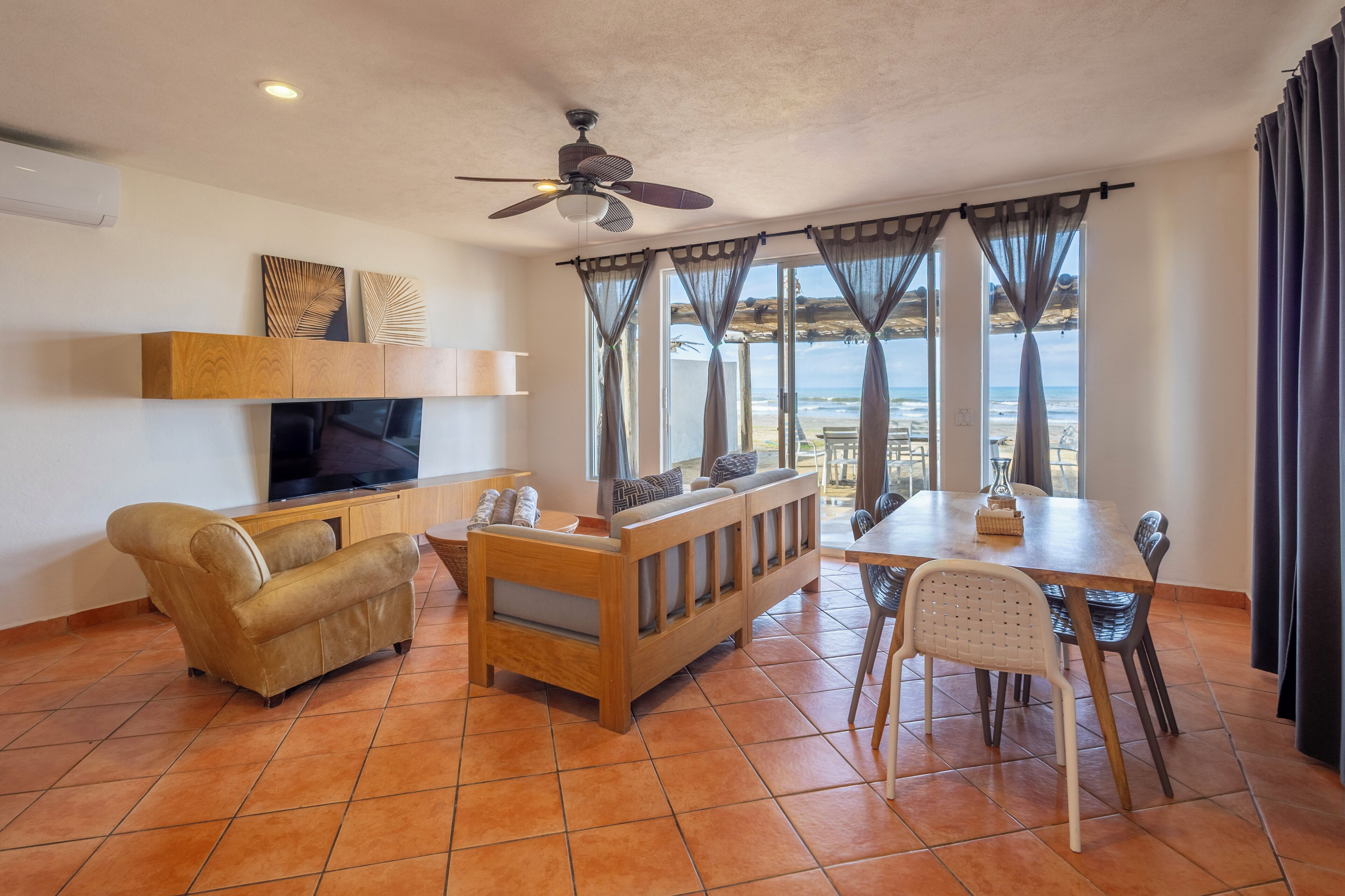 Two Bedroom Ocean Front Elite Villa | Living area | 42-inch Smart TV with digital channels, streaming services