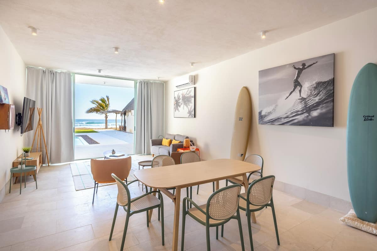 Deluxe Ocean Front Villa | Living area | 42-inch Smart TV with digital channels, streaming services