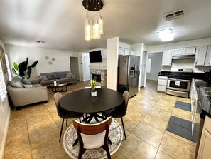 Kitchen, living & additional dining area for easy gathering & easy mornings
