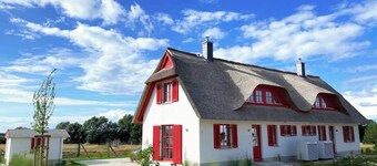 Haus zwischen Mühle und Meer