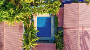 Outdoor pool - Sun-Kissed 2BR Oasis — A Pool & 5-Min to the Beach (Coco)