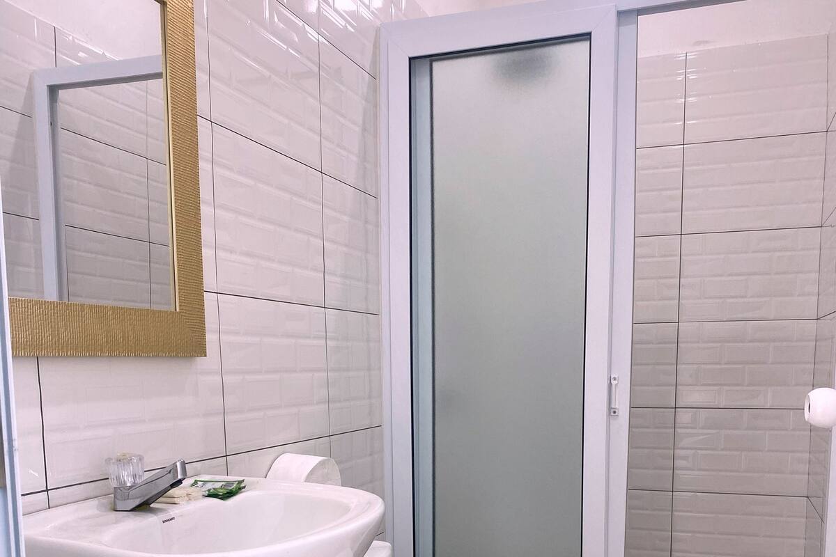 Shower, towels, soap, shampoo