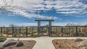 A gated entrance to a garden with a sign reading "CITRO GARDEN". - Charming townhome with WiFi, AC, Pool and Community Center in Peaceful Fallbrook (Fallbrook)