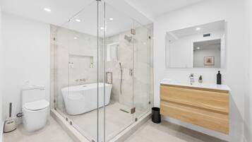 Shower, hair dryer, towels, soap