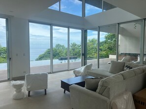 Living area - Modern Luxury Beach Front 300° views! (Playa Flamingo)