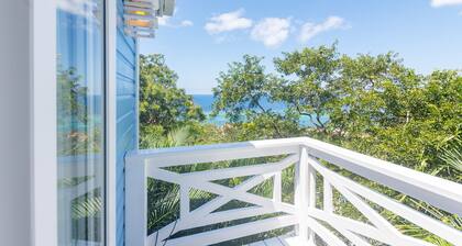 Experience tropical living at Casa Afortunada, 4-bedroom home with stunning ocean views.