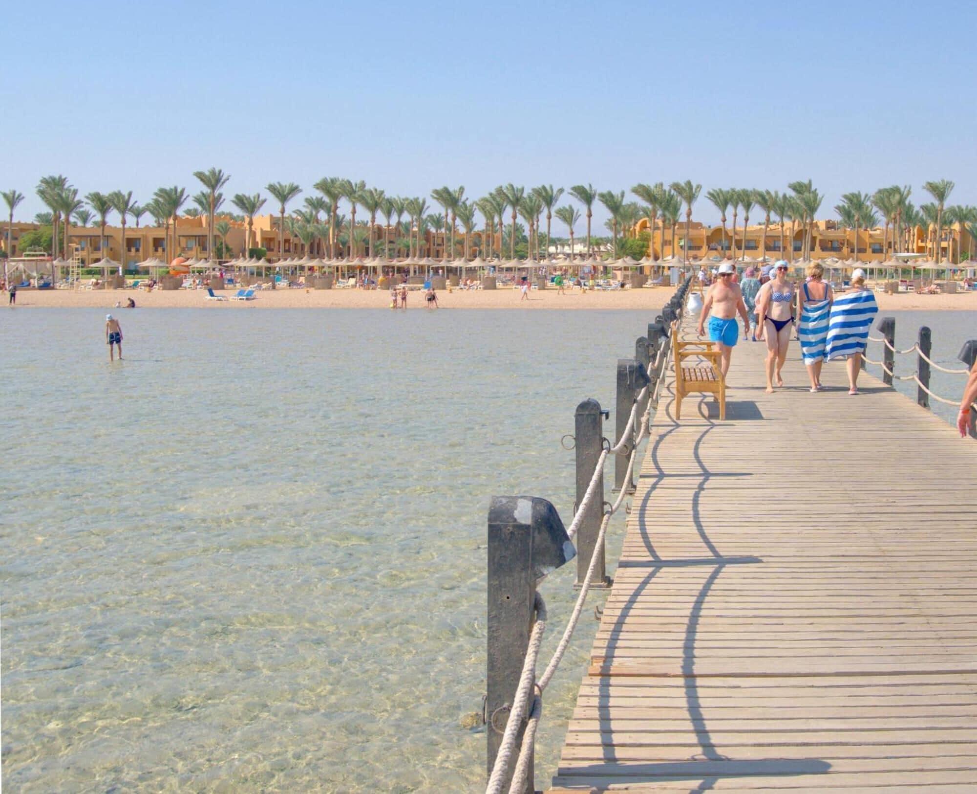 On the beach, sun loungers, beach towels