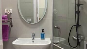 Hair dryer, towels, soap, toilet paper