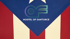 A wall with a large star and the text "Hostel of Santurce - Bed Station". - HOSTEL OF SANTURCE (San Juan)