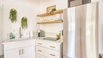 Fridge, microwave, stovetop, coffee/tea maker