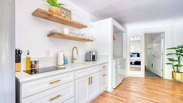 Fridge, microwave, stovetop, coffee/tea maker