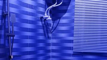 Shower, towels, soap, toilet paper