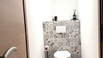 Hair dryer, towels, soap, toilet paper