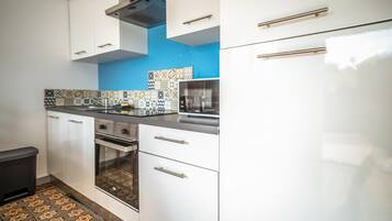 Réfrigérateur, four, plaque de cuisson, lave-vaisselle