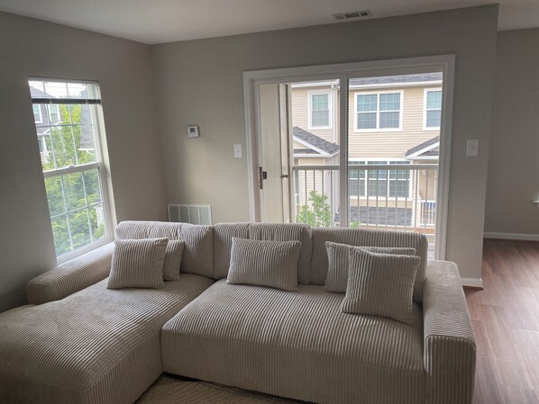 Living area - Fully furnished room in sun-drenched condo. 7 minute walk to Wheaton metro. (Silver Spring)