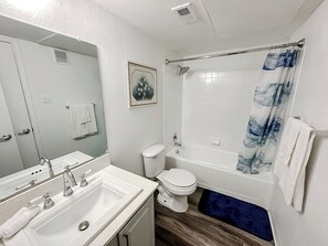 Hair dryer, towels, soap, shampoo