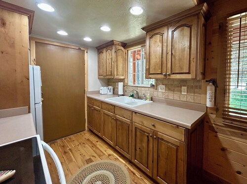 Spruce Fly on Bill's Island! Enjoy four private bedrooms and 2 full bathrooms!