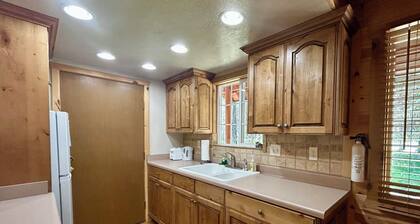 Spruce Fly on Bill's Island! Enjoy four private bedrooms and 2 full bathrooms!