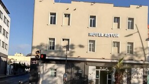 A building with a sign reading "HOTEL ASTUR" on the facade. - Hotel Astur (Guadalajara)