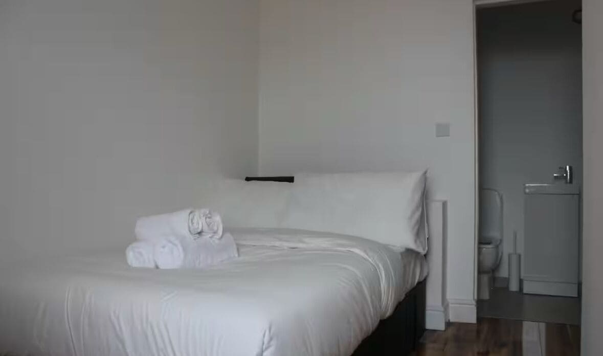 Desk, laptop workspace, blackout curtains, free WiFi