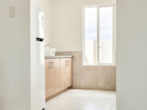 Microwave, oven, coffee/tea maker, cookware/dishes/utensils