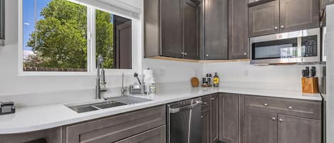 Fridge, microwave, dishwasher, coffee/tea maker