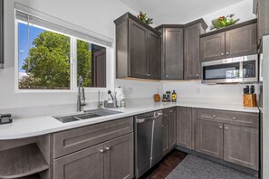 Fridge, microwave, dishwasher, coffee/tea maker