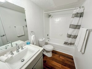 Hair dryer, towels, soap, shampoo