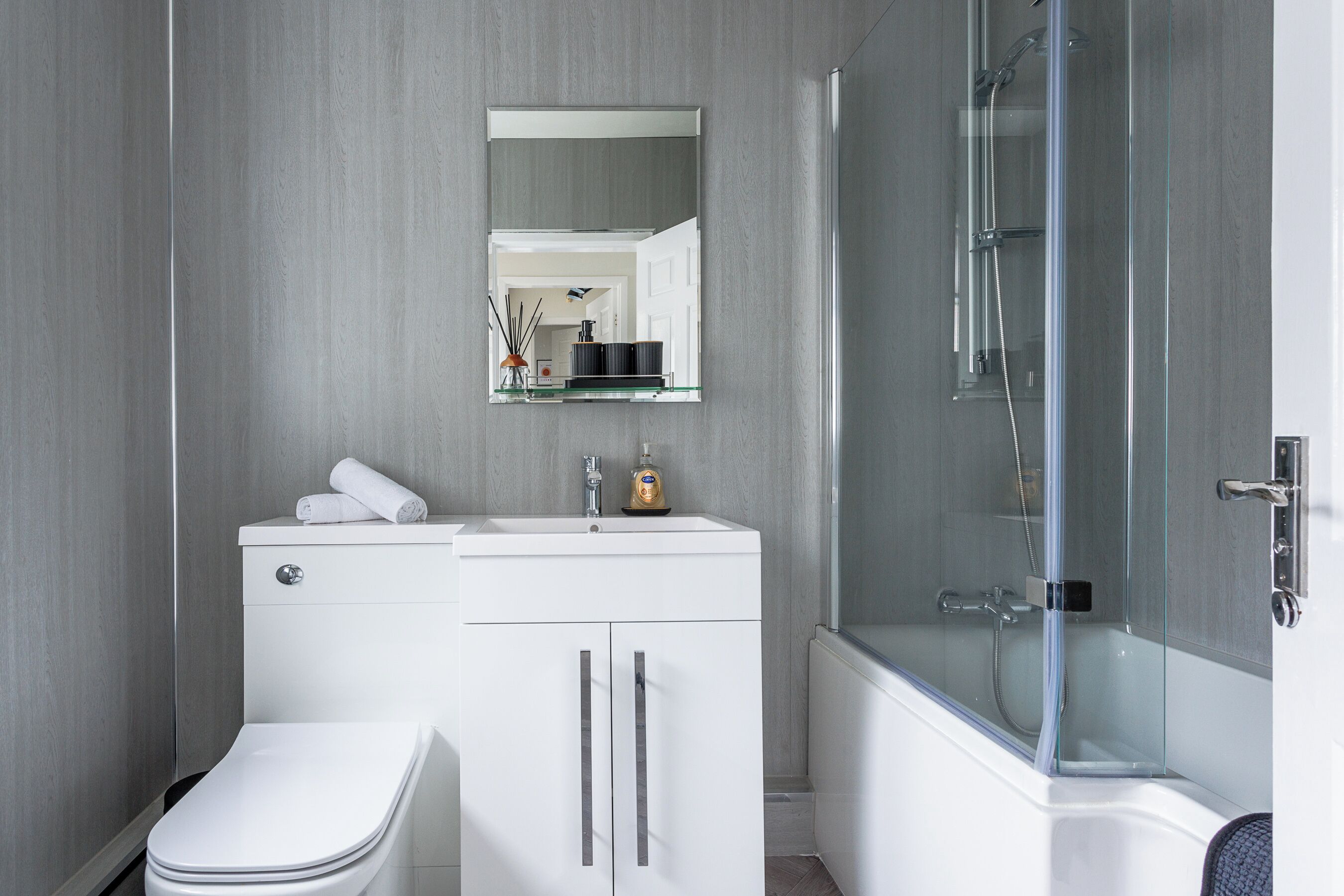 Hair dryer, towels, soap, shampoo