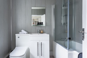 Hair dryer, towels, soap, shampoo