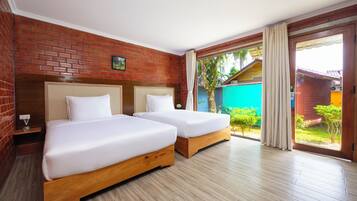 Tomannsrom – deluxe, hageutsikt | Safe på rommet, blendingsgardiner og wi-fi (inkludert)