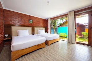 Deluxe Twin Room, Garden View | In-room safe, blackout drapes, free WiFi
