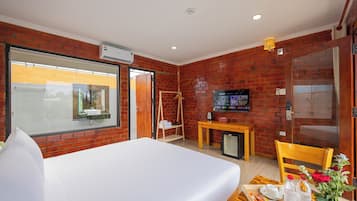 Deluxe Room, Pool View | In-room safe, blackout curtains, free WiFi