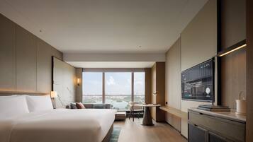 Premium bedding, down comforters, minibar, in-room safe