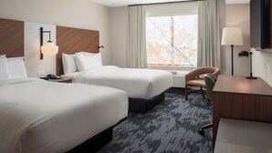 A hotel room with two beds, a desk, a chair, a TV, and a window with curtains. - Fairfield Inn & Suites Huntsville Madison (Madison)