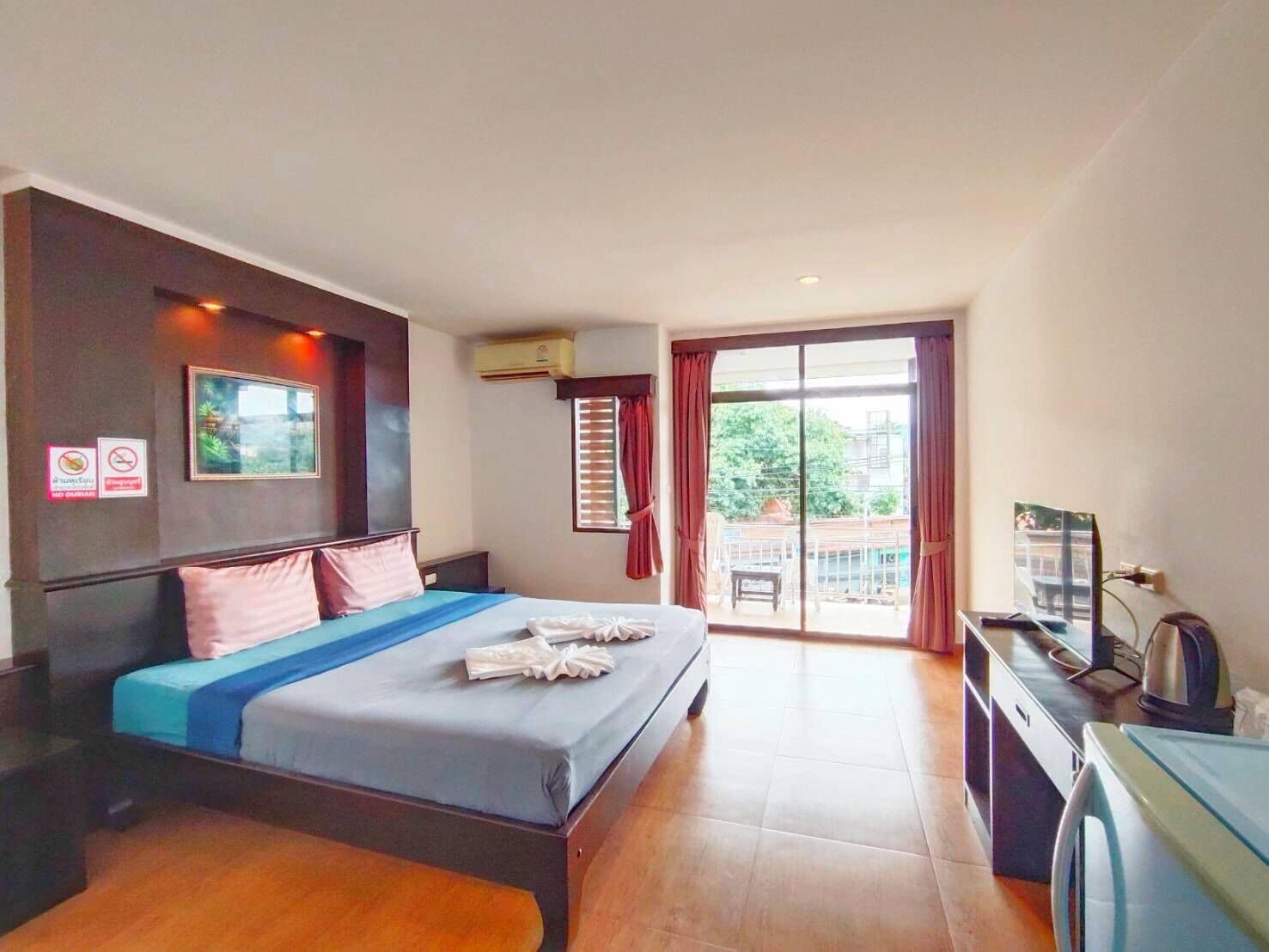 Standard Double Room, City View | In-room safe, desk, laptop workspace, blackout drapes