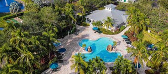 Lakefront retreat with heated pool, hot tub, gym & tennis