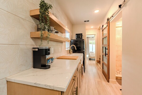 Fridge, microwave, coffee/tea maker, toaster