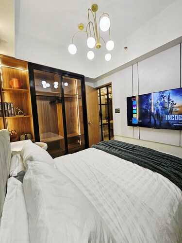 Luxury apartment at Bloom Residences with Balcony overlooking pool near NAIA/BGC