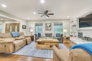 TV, fireplace, books