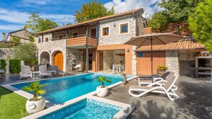 A stone villa with a swimming pool, outdoor seating, and a barbecue area. - Villa Mariva residence Crikvenica by Villas Guide (Tribalj)