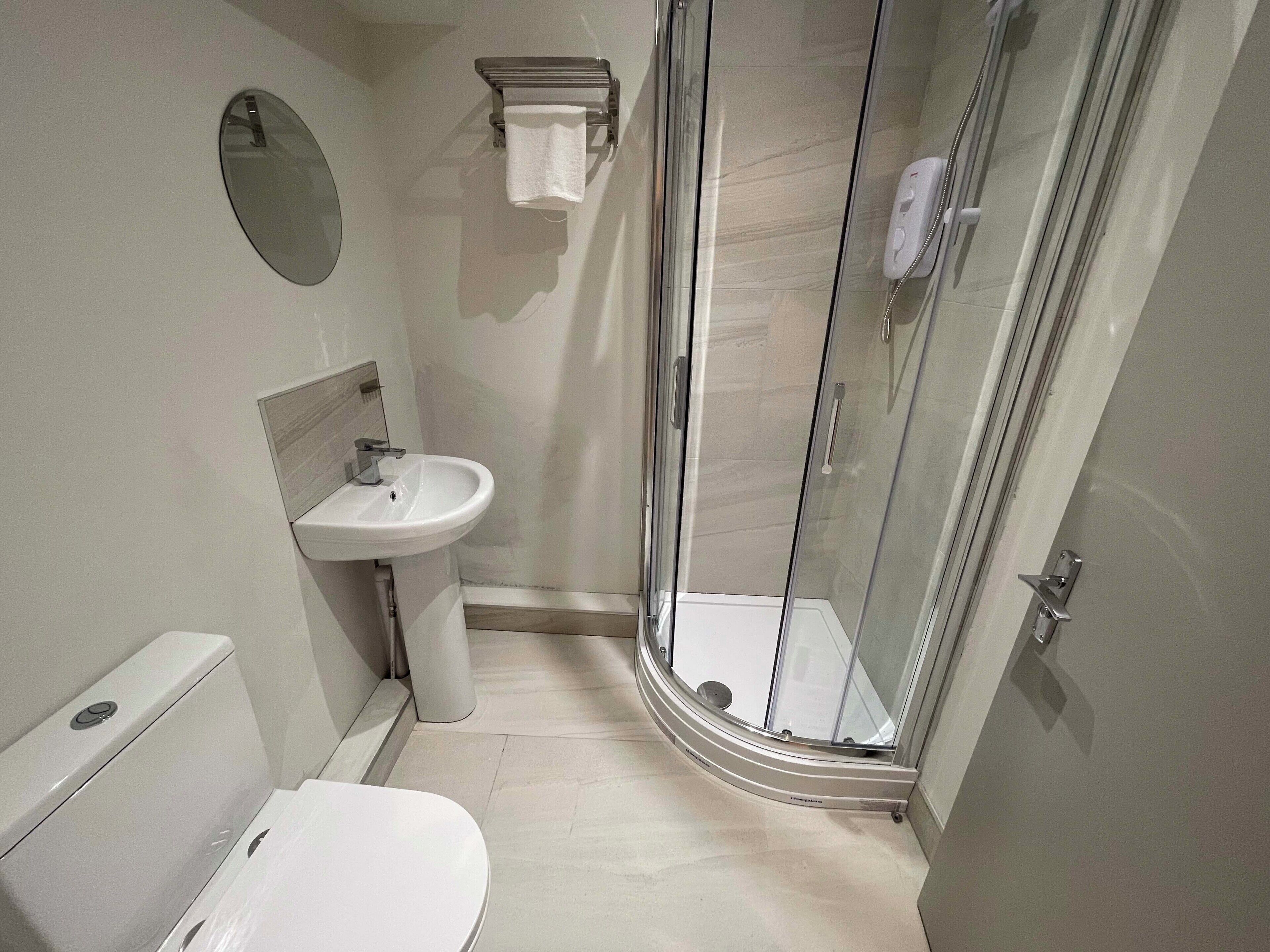 Shower, free toiletries, hair dryer, towels
