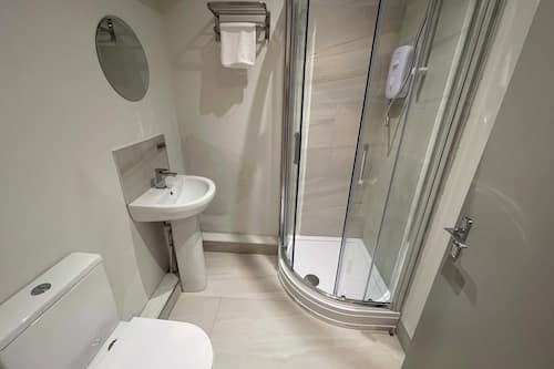 Shower, free toiletries, hair dryer, towels