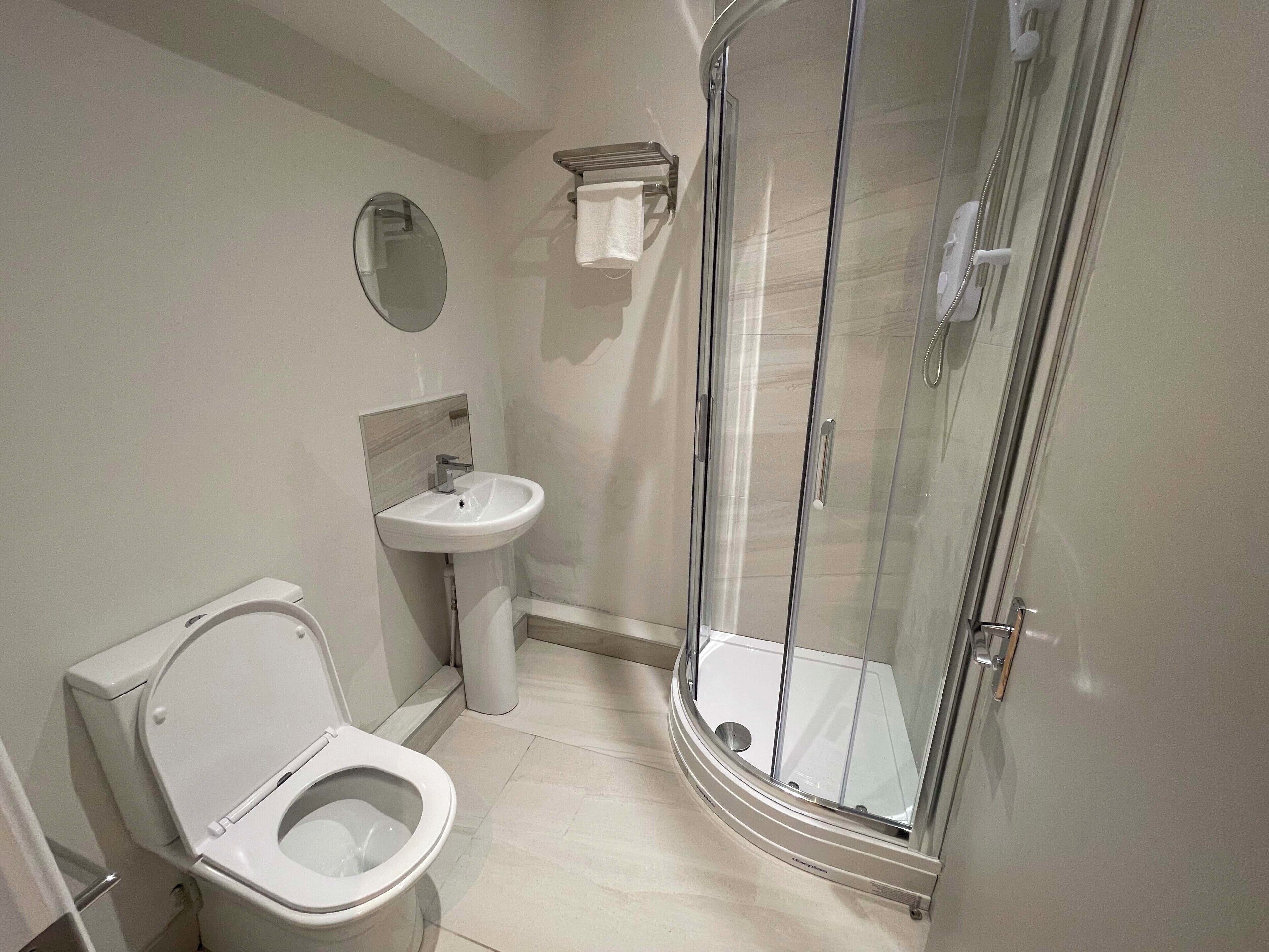 Shower, free toiletries, hair dryer, towels